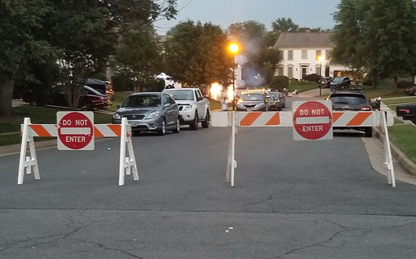 Barricades in place across road for block party