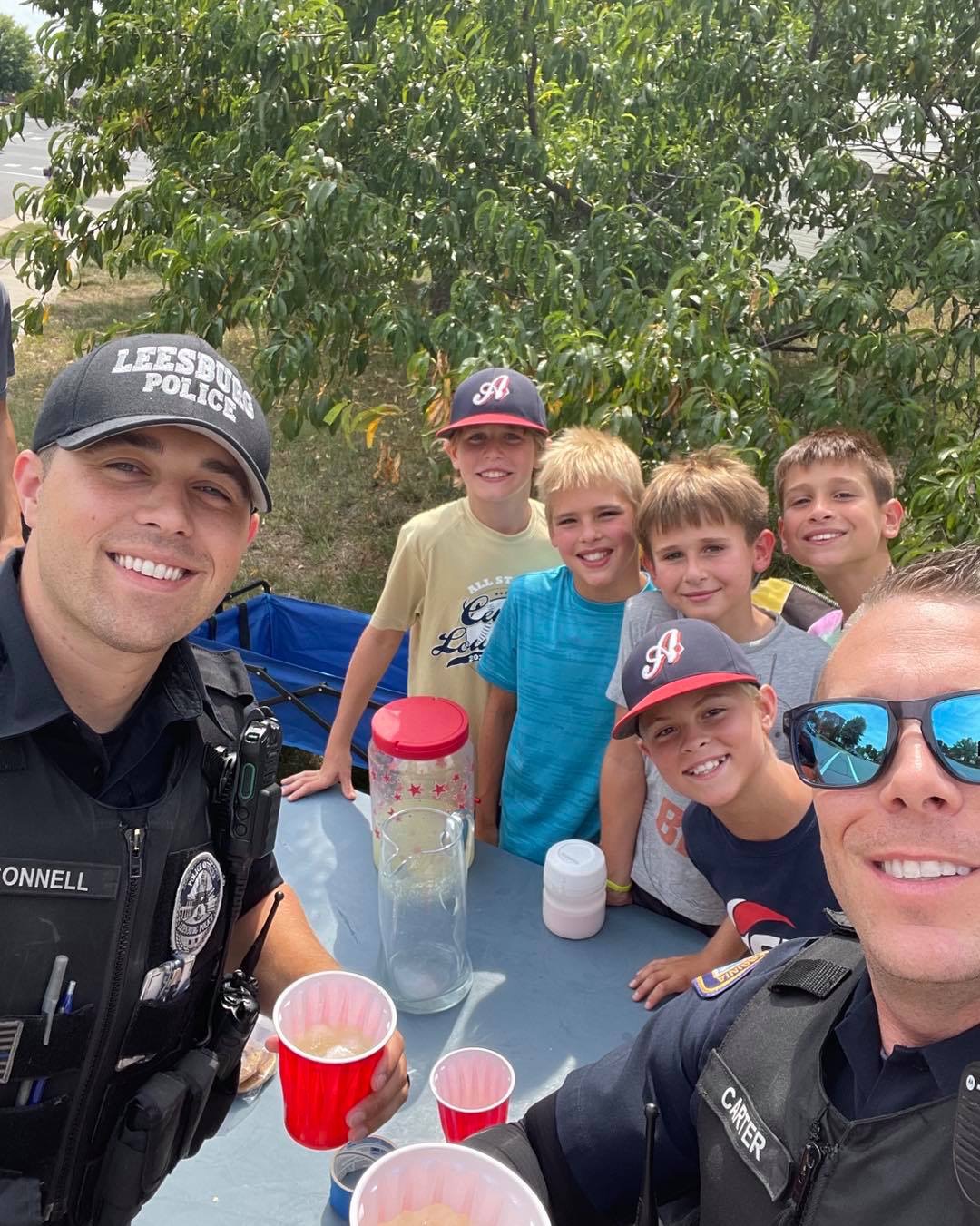 Officers attend a lemonade stand