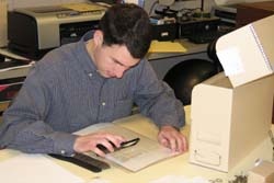 Intern processing manuscript collection